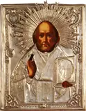 Russia, mid 19th century by Icon of Saint Nicholas the Miracle Worker, tempera on wood,  silvered and gilded brass oklad with repoussé and chased decoration, sold Sep 2014