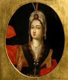 A woman in exotic costume, half-length by French School, oil on panel, sold Feb 2014