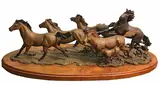 Douglas Van Howd, Running horses; Sable (group of two), first patinated bronze on a wooden base; second patinated bronze on a marble base