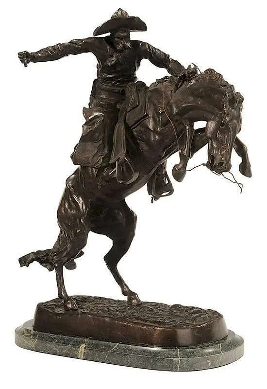 Bronco Buster by Frederic Remington, patinated bronze aftercast with marble base, offered Jul 2014