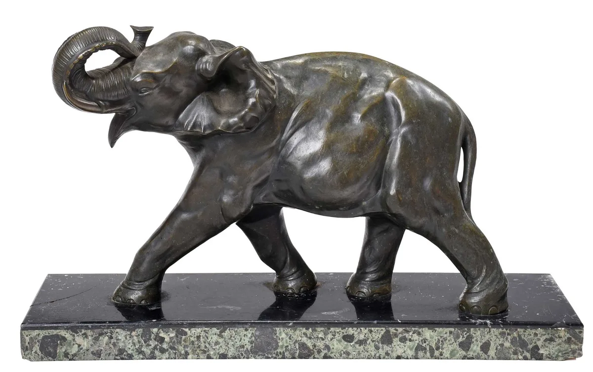 Walking Elephant by Michel Decoux, patinated bronze on marble base, sold Mar 2024