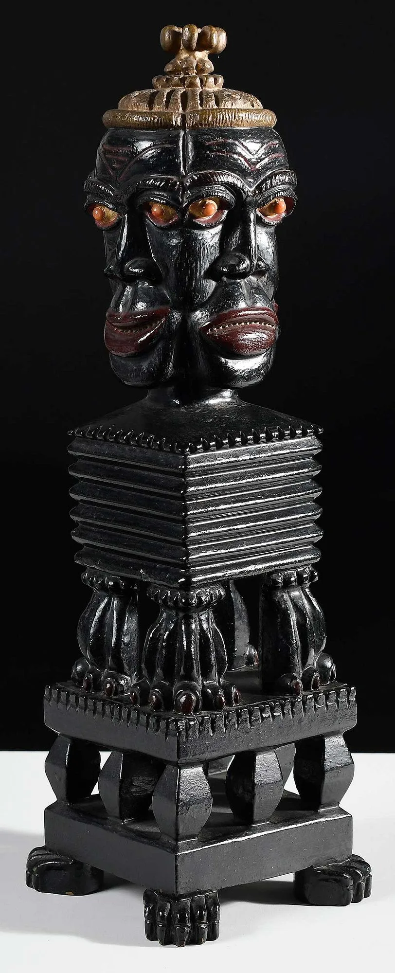 Lost Tribes by Ulysses Davis, carved and painted wood with applied beads, sold Jan 2025