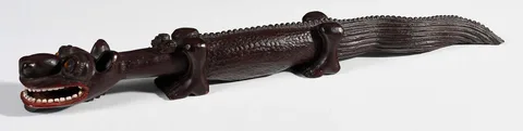 Ulysses Davis, Alligator-Like Beast, carved and painted wood with applied beads