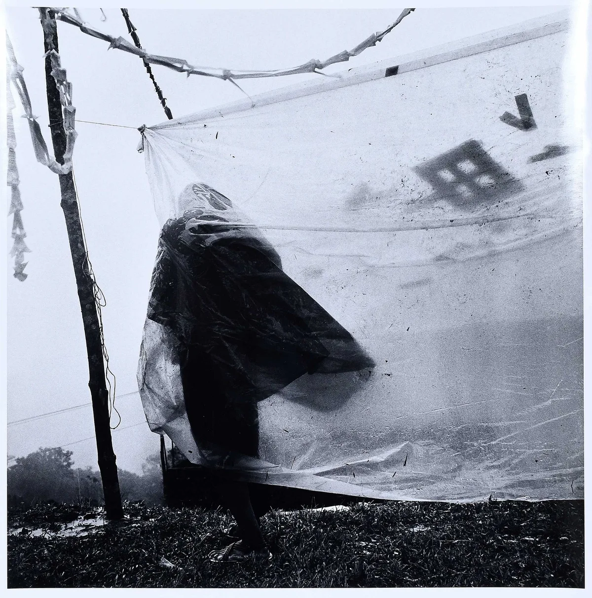 Debbie Fleming Caffrey, Santiago, Mexico (retreating person), 1997, gelatin silver print. sheet
