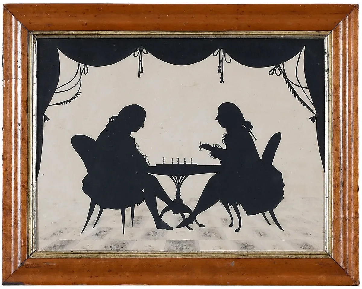 Two Gentlemen Playing Chess by Auguste Edouart, ink cutout on cream paper with ink wash and details, sold Mar 2023