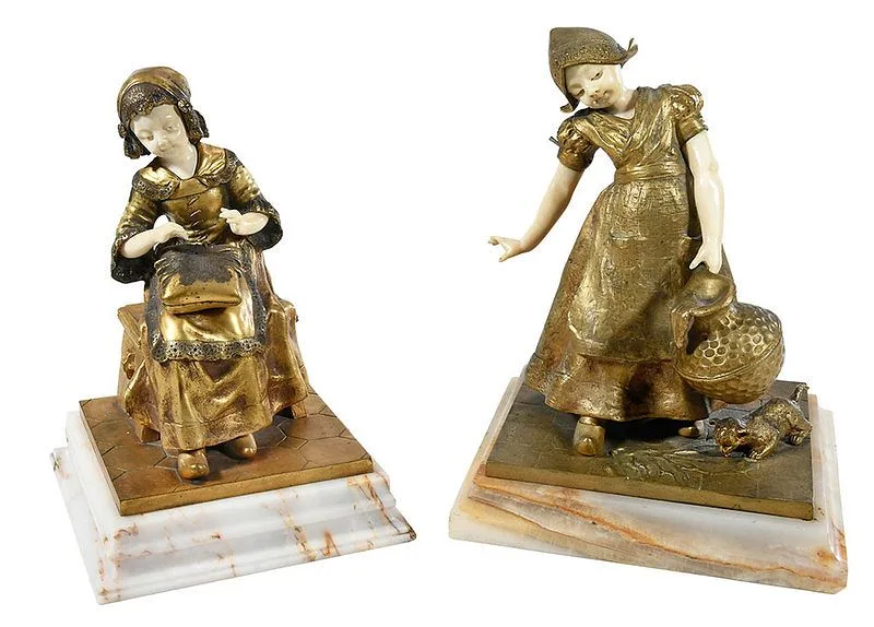 Charles Monginot, The Little Lace Maker, Spilled Milk, gilt bronze and ivory on steeped agate plinths