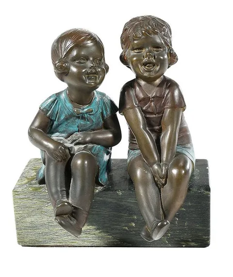 Laughing Children by Demetre Chiparus, patinated bronze on green marble base, sold May 2020