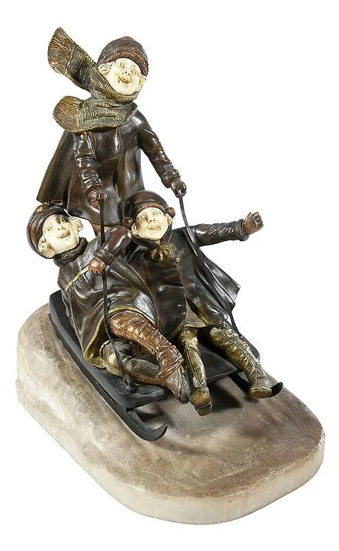 Children Sledding by Demetre Chiparus, bronze and ivory on an alabaster base, sold May 2020