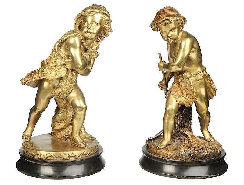 EugŠne Laurent, A pair of allegorical figures: The Little Harvester (Autumn), no. 7713, The Little Skater (Winter), No. 7715, both signed "E. Laurent", foundry 'coin' "A.B. Paris" with dogs in relief, gilt bronze