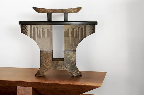 Mary Van Cline, Along the Curve of Time, 2000, bronze and copper leaf patina