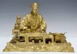 Judith Gautier, Portrait of Din-Dunling at work table, Gilt-bronze sculpture