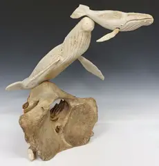 George Vukson, Mother and Calf, Fossilized whale bone carved sculpture