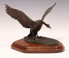 Paul Everett Tadlock, Landing Canada Goose, Patinated bronze sculpture