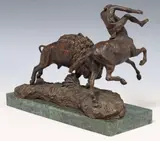 Buffalo Hunt by Charles Marion Russell, Patinated bronze figural group, sold Feb 2024
