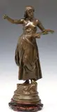 Auguste Paris, La Chanson, Patinated bronze figural sculpture/ clock topper