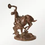 The Bucker and the Buckaroo by Charles Marion Russell, bronze, sold Jul 2025