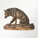 Wolf with Bone by Charles Marion Russell, 1908, painted plaster, sold Jul 2025