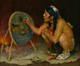 Decorating the War Shield by E. Irving Couse, oil on canvas, sold Jul 2014