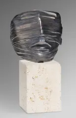 MASKA by Igor Mitoraj, 1977, metal srebrzony, podstawa z białego kamienia, sold Nov 2019