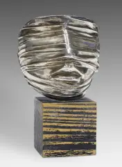 Głowa w draperii by Igor Mitoraj, metal srebrzony, podstawa drewniana, sold Nov 2016