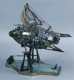 Jakub Łęcki, Żaglowiec pionowego startu, 2003, brąz, szkło witrażowe, siatka metalowa, soczewka