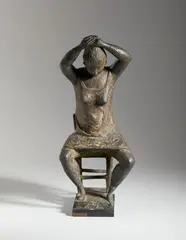 Carlo Mandelli, DONNA CHE SI PETTINA, sculpture