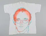 T-SHIRT CON RITRATTO DI K.HARING by Andy Warhol, print (other), sold May 2025