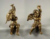 Coppia di angeli portacero in legno scolpito e dorato by Scultore Italiano Del Xviii Secolo, sculpture, sold Oct 2022