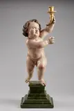 Putto portacero in legno policromo su base dipinta a finto marmo verde by Scultore Italiano Del Xviii Secolo, sculpture, sold Dec 2021