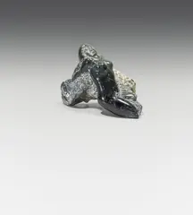Falling woman by Oskar Bottoli, 1983, serpentine, sold Apr 2022