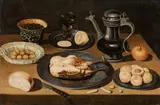Osias Beert, Still life with roasted chicken, olives, fruit and bread, oil on panel, parqueted