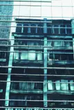 Wolff Buchholz, 3 Bll.: New York - Fassade mit Spiegelung. Manhattan - Spiegelung (5). Manhattan - Spiegelung (6), 1990, Colour photography