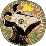 Tête de chèvre de profil by Pablo Picasso, 1952, Plate of white faience, the representation embossed and with oxidised paraffin painting in reddish brown, black, yellow , sold Sep 2021