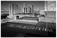 Kid Zoom, This City Will Eat Me Alive [Overlooking New York, July 2010], 2010, digital photograph - documentation of site-specific intervention ed. A/P