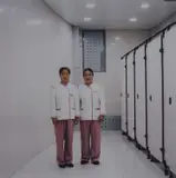 Selina Ou, Restroom Attendants - Changchun, China, 2003, chromogenic photograph