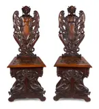 Robert Wilhelm Prenzel, , A PAIR OF BLACKWOOD CARVED HALL CHAIRS