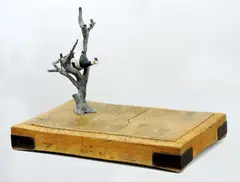 Cow up a Tree 2000 by John Kelly, 2000, painted bronze on wooden butcher's chopping block, offered Dec 2011