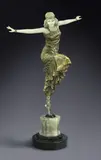 Paul Philippe, Russian Dancer, early 20th century, bronze and ivory, the female dancer with outstretched arms and one leg raised on a circular onyx marble base