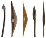 SOUTH EAST AUSTRALIA by A Collection of Artefacts, carved hardwood and pigment, sold May 2013