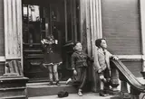 Helen Levitt, Masked Children on Stoop, New York