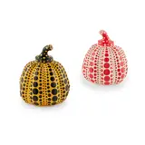 PUMPKINS (YELLOW/BLACK AND RED/WHITE) by Yayoi Kusama, The set of two cast resin multiples, 2016, each stamped with the artist's name on the underside, in original boxes, sold Apr 2022