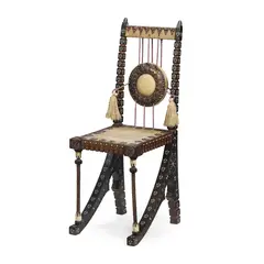 Carlo Bugatti, CHAIR, CIRCA 1908, carved and ebonised wood, Italian walnut, pewter and bone inlay, vellum, copper and rope
