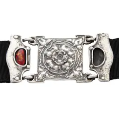 ARTS & CRAFTS BUCKLE, 1901 by Omar Ramsden, enamel, on later fabric belt, twice stamped RN&C, hallmarked London 1901, offered Oct 2025