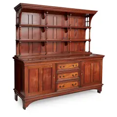 Philip Webb, ARTS & CRAFTS MAHOGANY SIDEBOARD, CIRCA 1900, the base with three central drawers flanked by panelled doors above carved apron, above stile supports