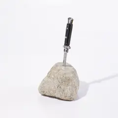 Mark Bradford, The Once and Future King (P. 89), 2011, Multiple comprising knife with metal blade in stone