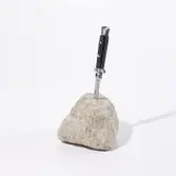 Mark Bradford, The Once and Future King (P. 89), 2011, Multiple comprising knife with metal blade in stone