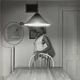 Carrie Mae Weems, Untitled (Woman Feeding Bird), from FOUR, 1990/2022, Inkjet print in colors, on Hahnemühle paper, the full sheet