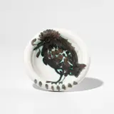 Oiseau au ver (Bird with Worm) (A.R. 172) by Pablo Picasso, 1952, White earthenware round ashtray painted in black with partial brushed glaze; ceramic, Madoura edition, sold Apr 2025