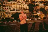 Pawel laughing on the beach, Positano, Italy by Nan Goldin, 1996, Dye destruction print, sold Apr 2025