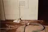 William Eggleston, Untitled (White Phone and Vacuum Cleaner)